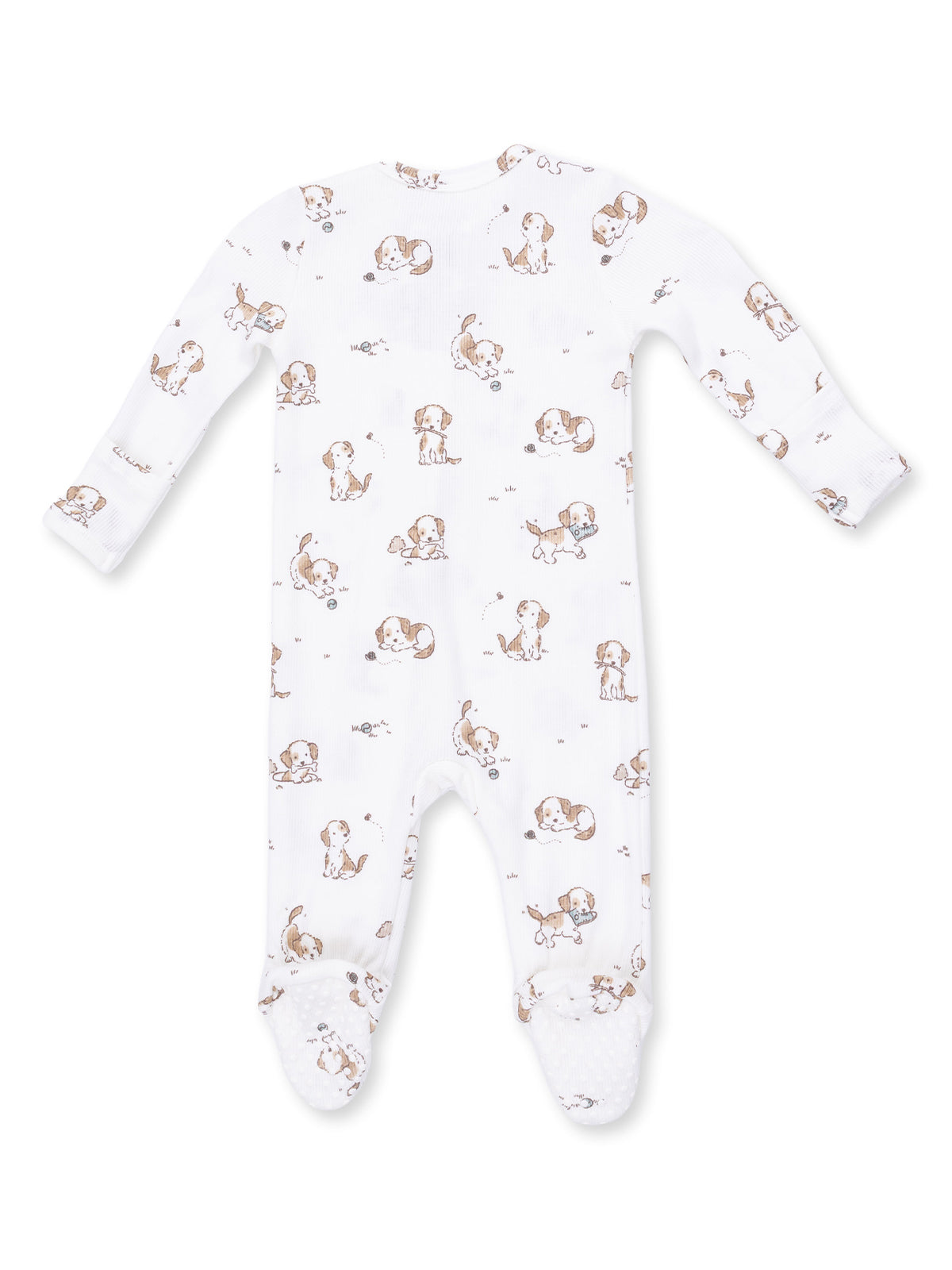 White baby onesie featuring playful puppy print and grippy feet for comfort and safety. Ideal for lounging or sleep.