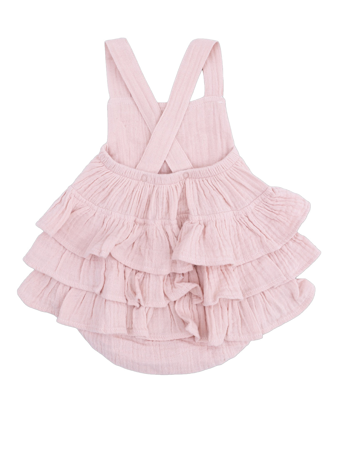 Light pink tiered dress with cross-back straps, featuring soft ruffles for a playful and stylish look.