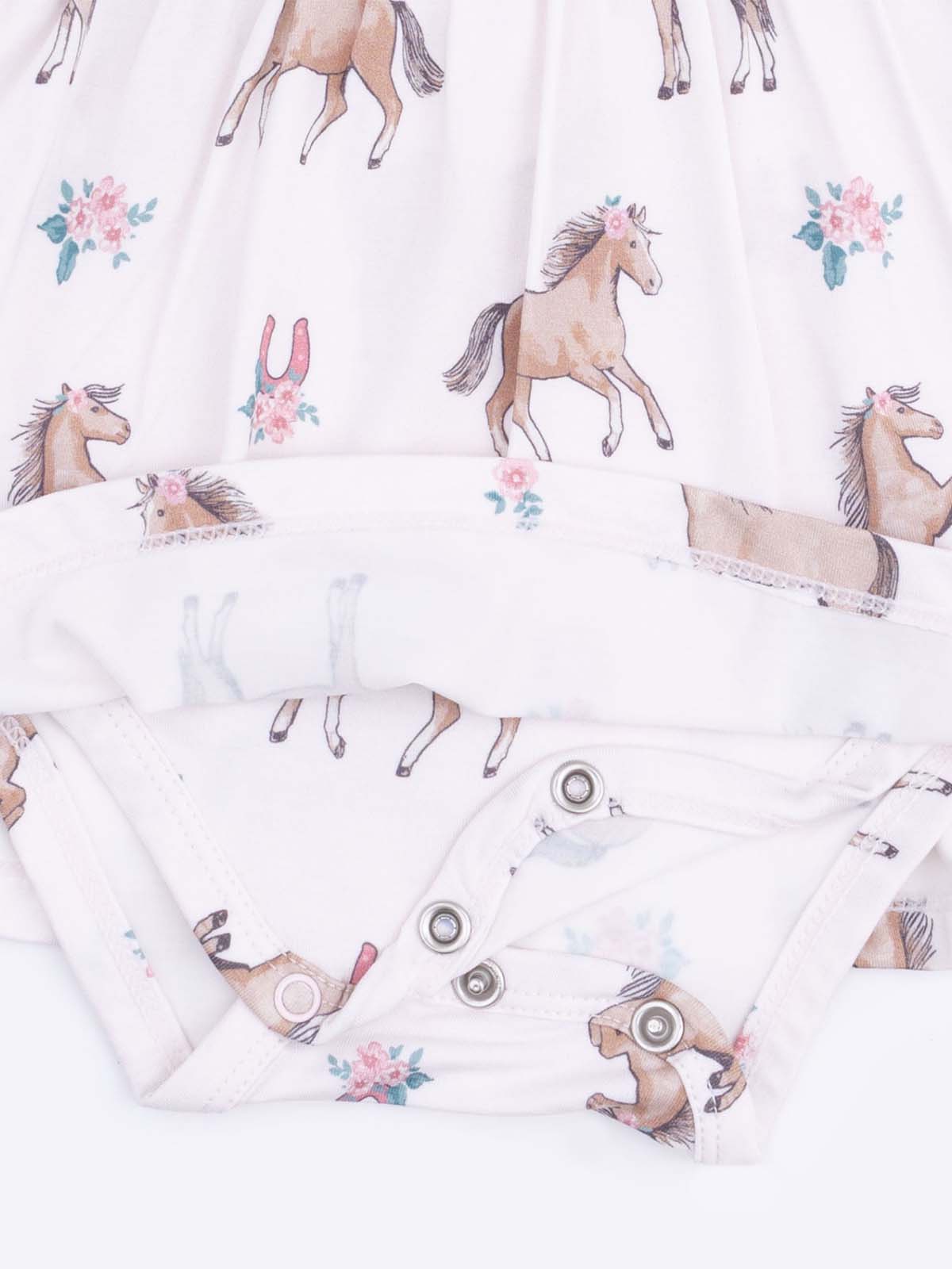 Baby onesie with a horse and floral pattern, featuring snap closure at the bottom.