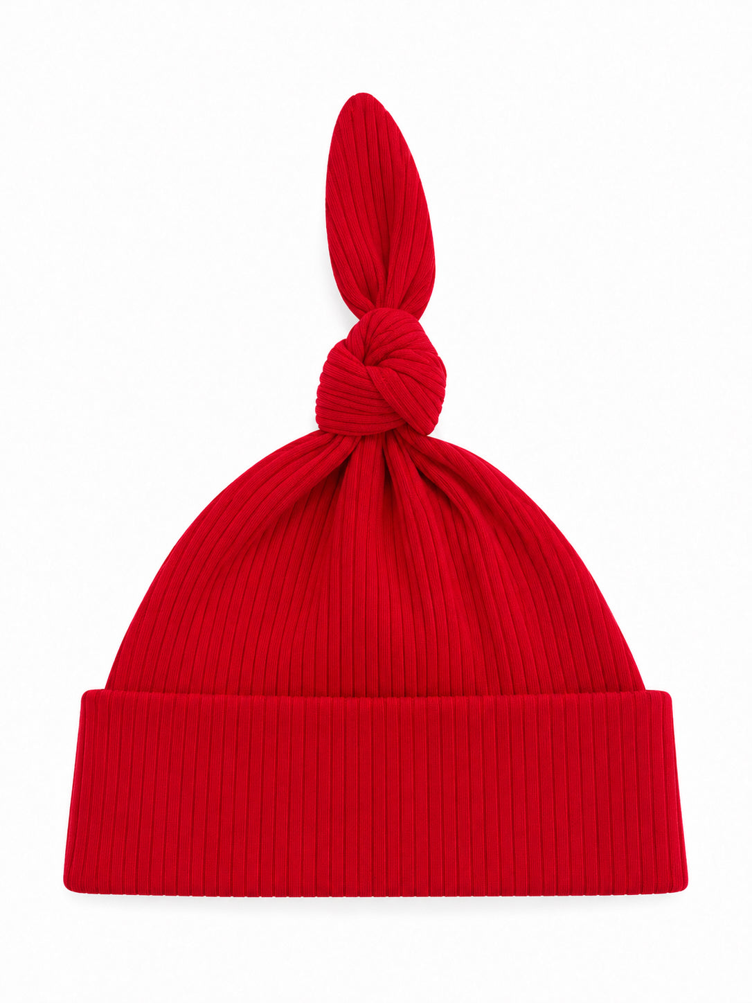 Red ribbed knit beanie with a twisted top knot, displayed against a white background.