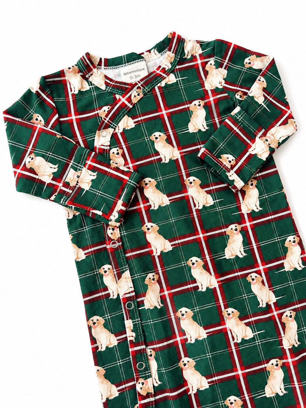 Green plaid infant pajama with playful dog prints, suitable for ages 0-3 months.
