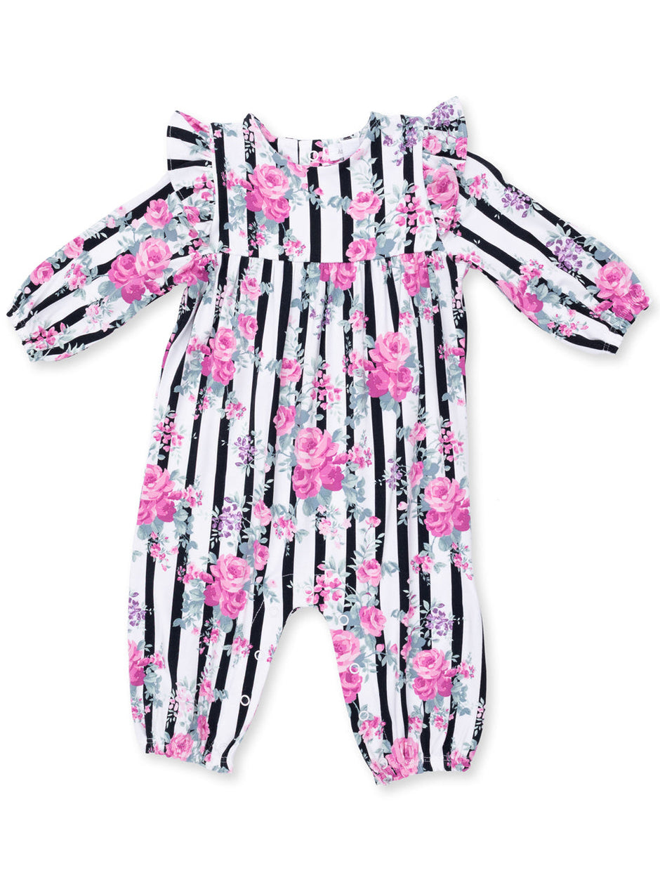 Floral romper with pink roses and black stripes, featuring puffed sleeves and a ruffled neckline.