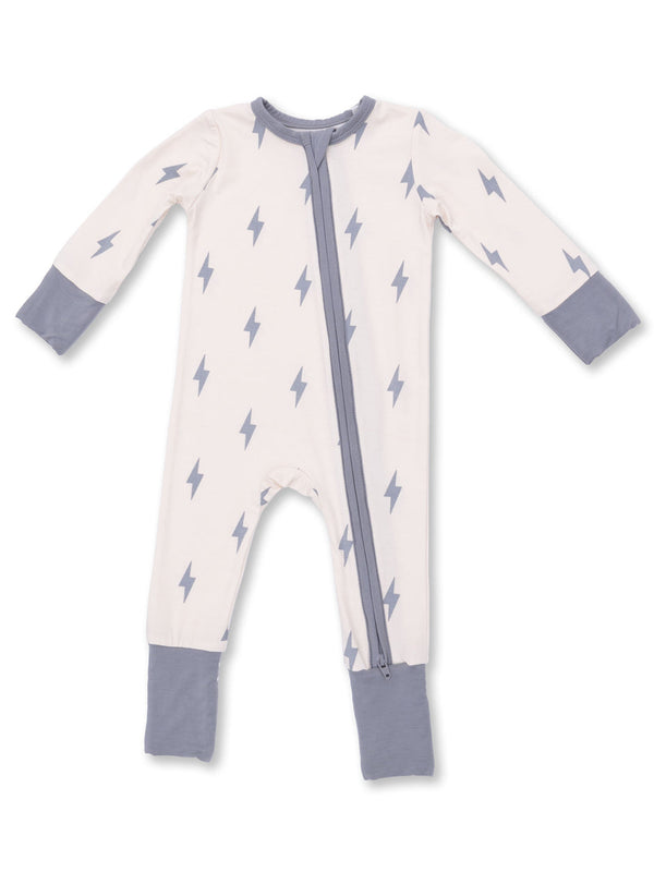 Light-colored infant onesie with lightning bolt patterns and contrasting gray sleeves, featuring a front zipper.