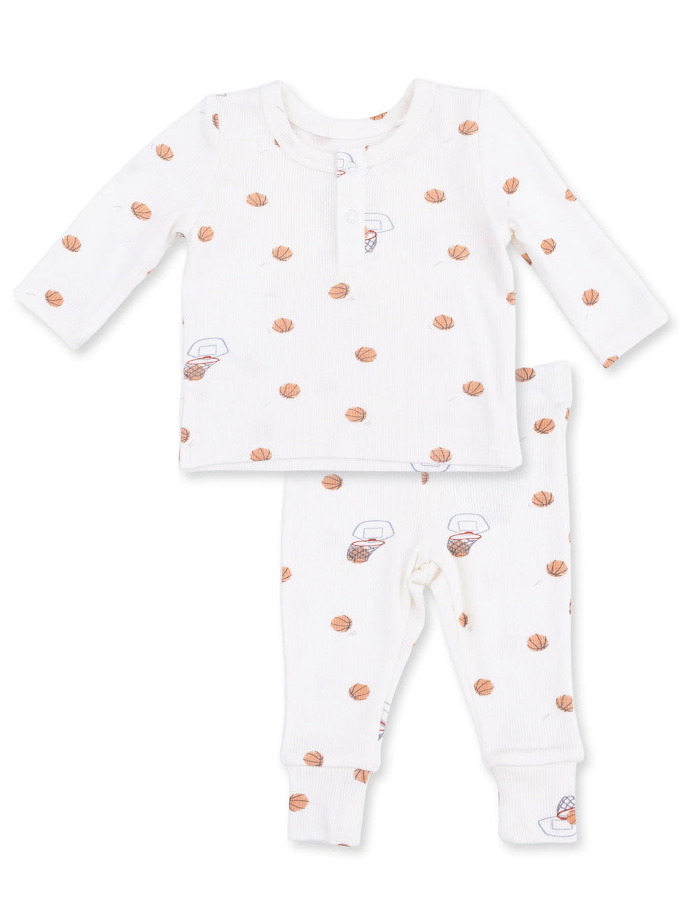White baby pajamas with basketball print, featuring a long-sleeve top and matching pants.