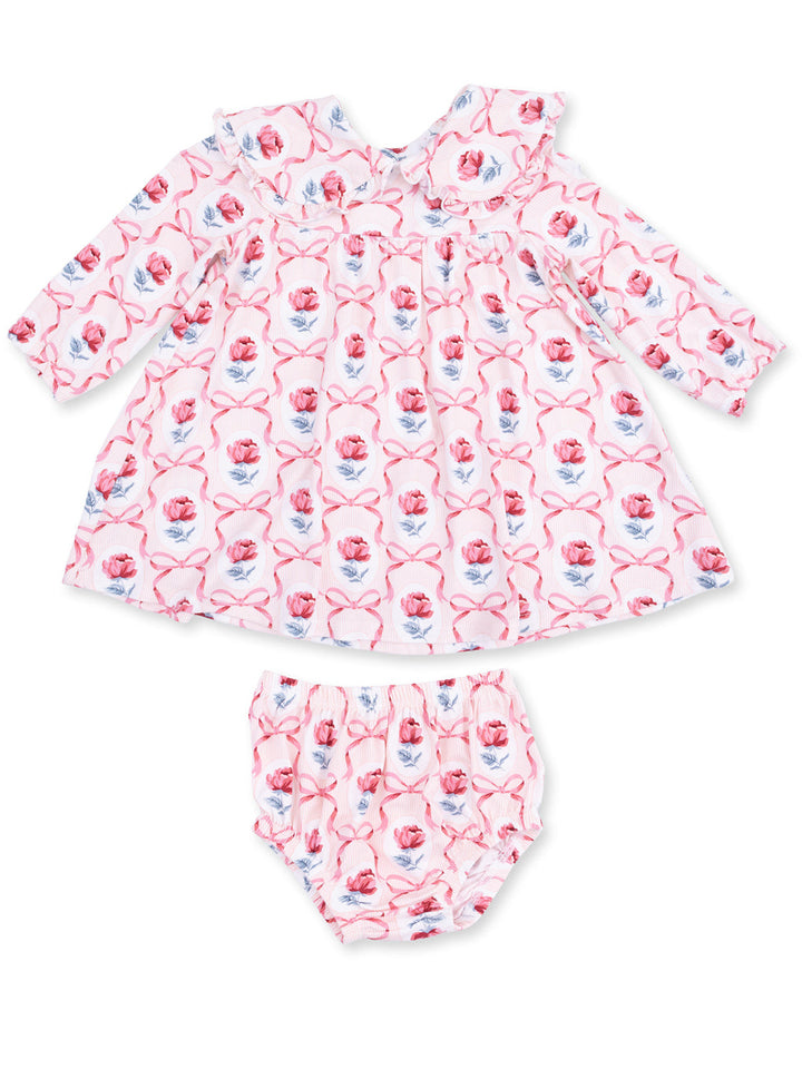Pink floral baby dress with ruffled collar and matching bloomers, featuring roses and ribbons in a soft fabric.