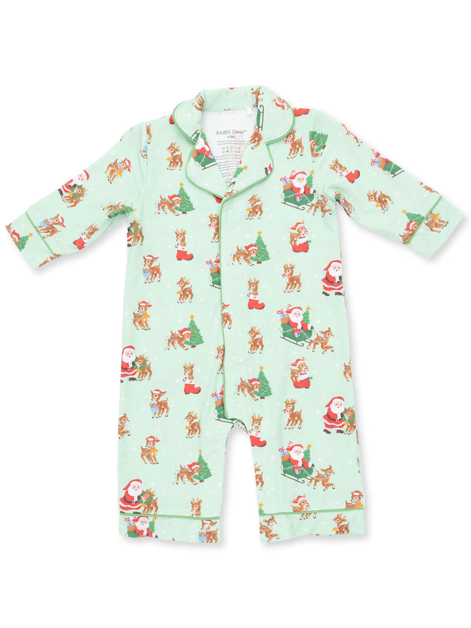 Light green pajamas with Christmas prints featuring Santa, reindeer, and festive trees. Ideal for holiday sleepwear.