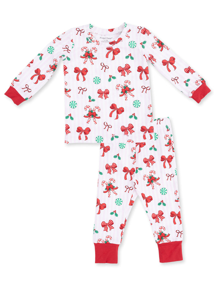 Red and white holiday-themed pajamas featuring candy canes, bows, and peppermint designs.
