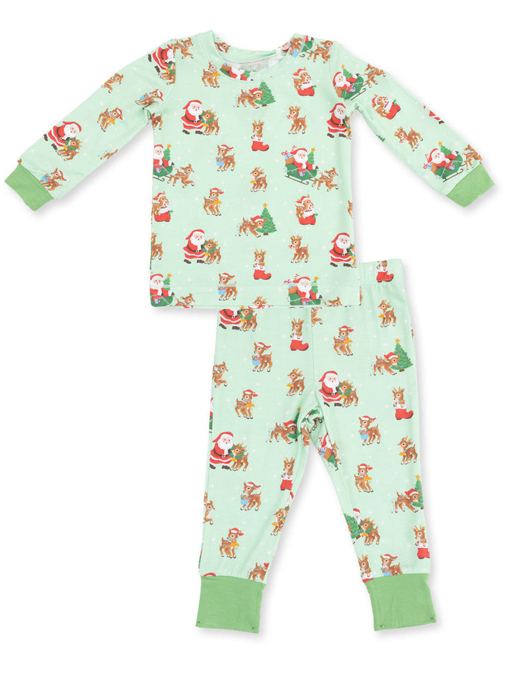 Christmas-themed kids' pajama set featuring Santa and reindeer on a mint green background.
