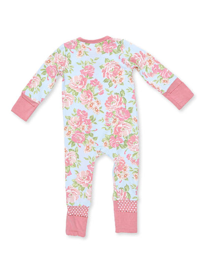Floral-patterned baby onesie with pink accents, showcasing a back view.