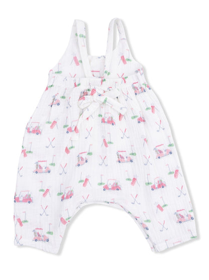 White baby romper with golf-themed pattern, featuring golf carts, clubs, and flags, tied with a cute bow.