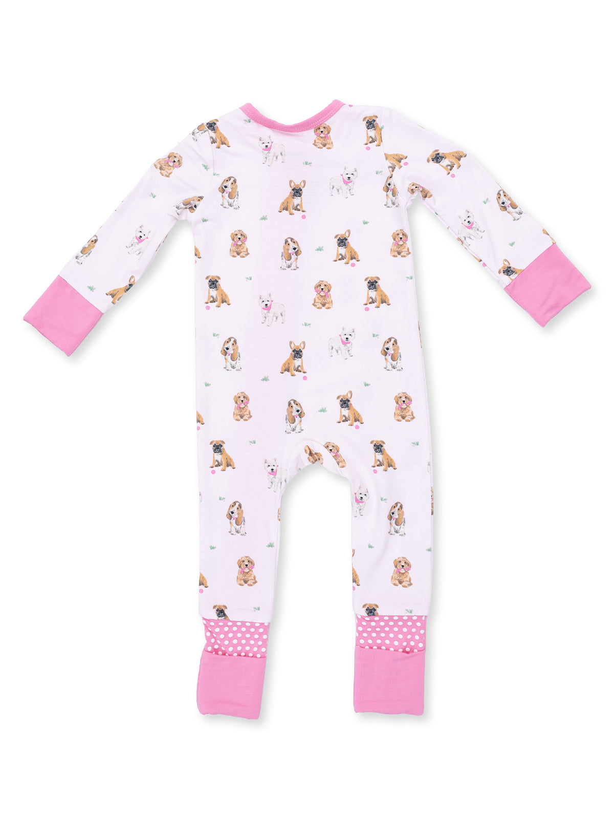 White pajamas with pink trim, featuring a playful dog pattern in various breeds all over.