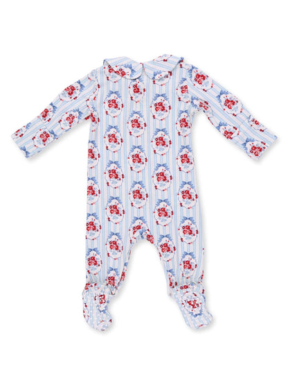 Floral-patterned children's onesie with blue stripes and a collar, featuring a festive design in red and blue hues.