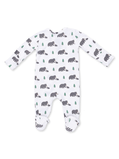 White baby onesie with bear and tree patterns, featuring long sleeves and footed design.