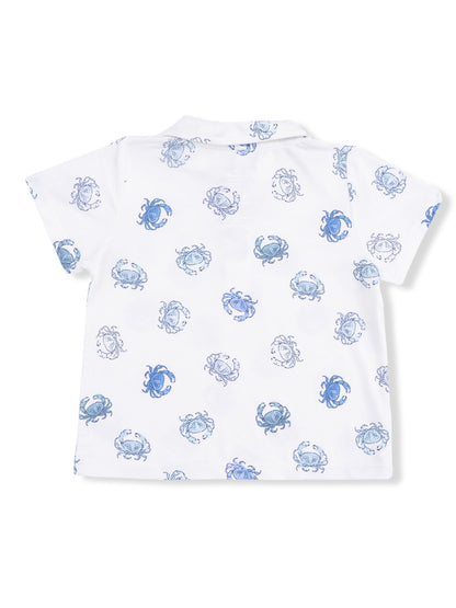 White shirt featuring a playful blue crab pattern, viewed from the back.