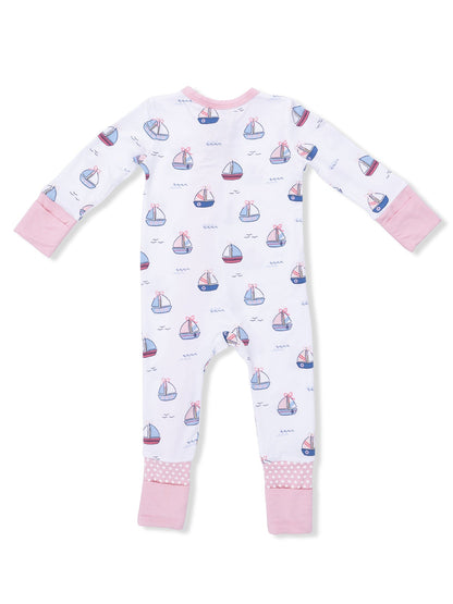 Baby footed pajamas featuring a boat print with pink accents, viewed from the back. Ideal for cozy sleepwear.