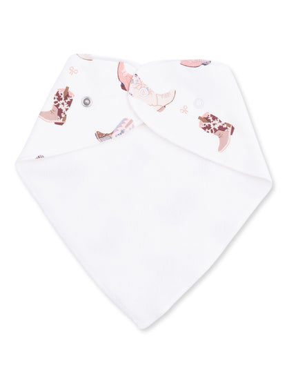 Bib with pink and brown boot prints on white fabric, featuring a button closure for easy adjustment.