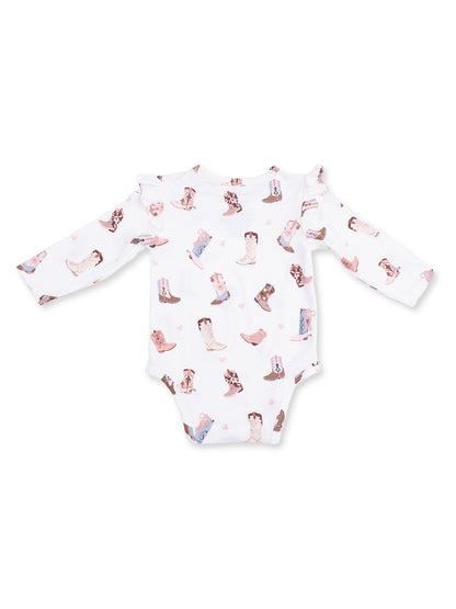 White baby bodysuit with long sleeves, featuring a playful cowboy boot print.