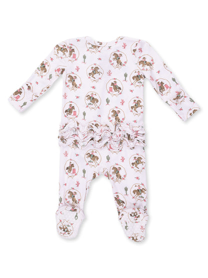 White baby onesie with cactus and cowboy print, featuring long sleeves and ruffled detailing on the waist.