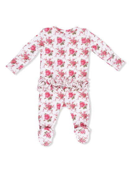 White floral infant onesie with long sleeves and ruffled back, featuring pink roses and footed design.