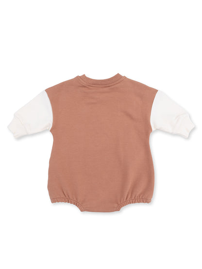 Back view of a brown and white infant onesie with long sleeves and a rounded neckline.