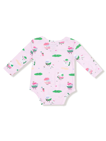 Pink baby onesie featuring playful cupcake and ice cream prints. Long sleeves and a back button closure.