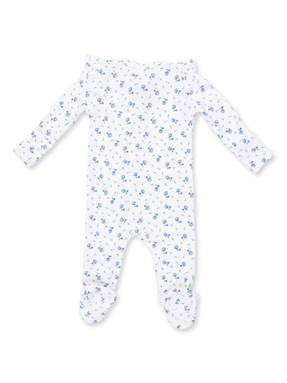 White baby onesie with blue floral pattern and long sleeves.