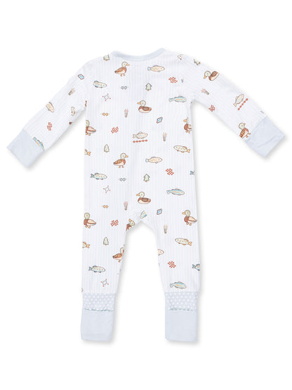 Back view of a white baby onesie with colorful fish and duck patterns. Soft fabric with blue accents on cuffs.