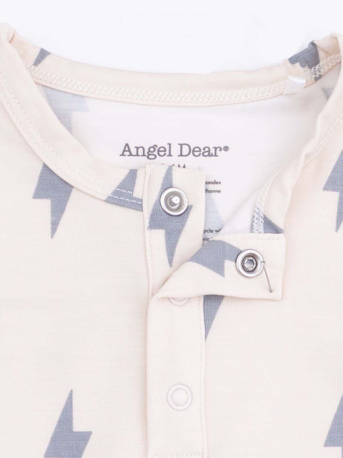 Cream-colored fabric with gray lightning bolt patterns and a snap closure from the brand Angel Dear.