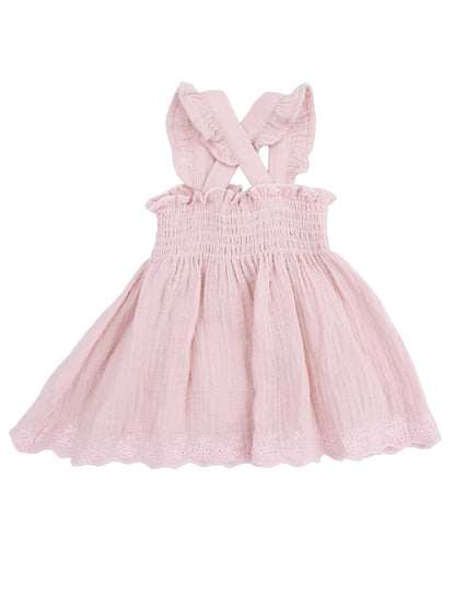Light pink dress with ruffled straps and floral embroidered hem, perfect for summer outfits.