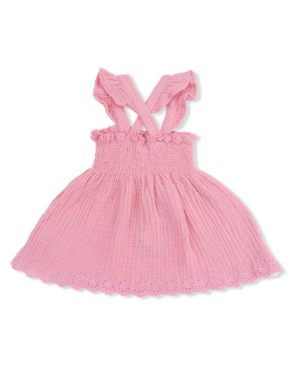 Light pink toddler dress with ruffled straps and embroidered hem, perfect for warm weather outings.