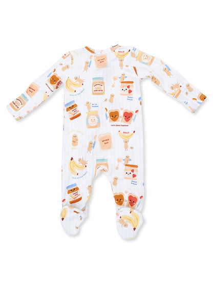 Cute children's pajama onesie with playful peanut-themed patterns and colorful graphics.