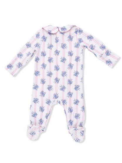 White baby onesie with blue floral patterns and pink stripes, featuring a rounded collar and long sleeves.