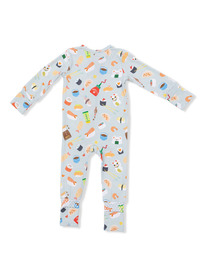 Blue pajamas featuring colorful food illustrations, including sushi, drinks, and snacks, viewed from the back.