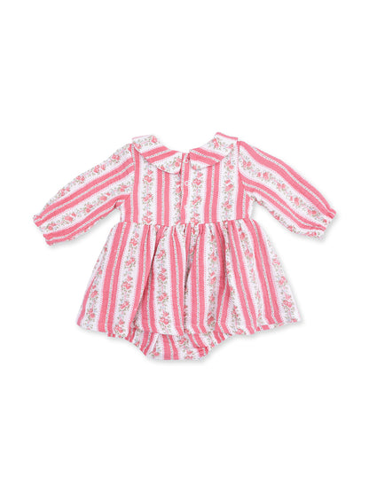 Pink striped baby dress with floral patterns and a collar, featuring a button closure at the back.