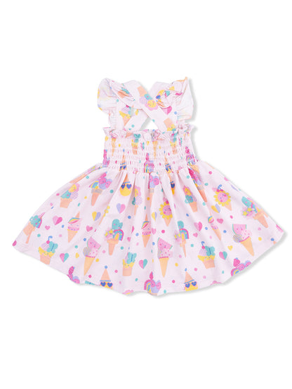 Pink dress with ice cream and heart patterns, featuring ruffled straps and a flared skirt. Perfect for summer wear.