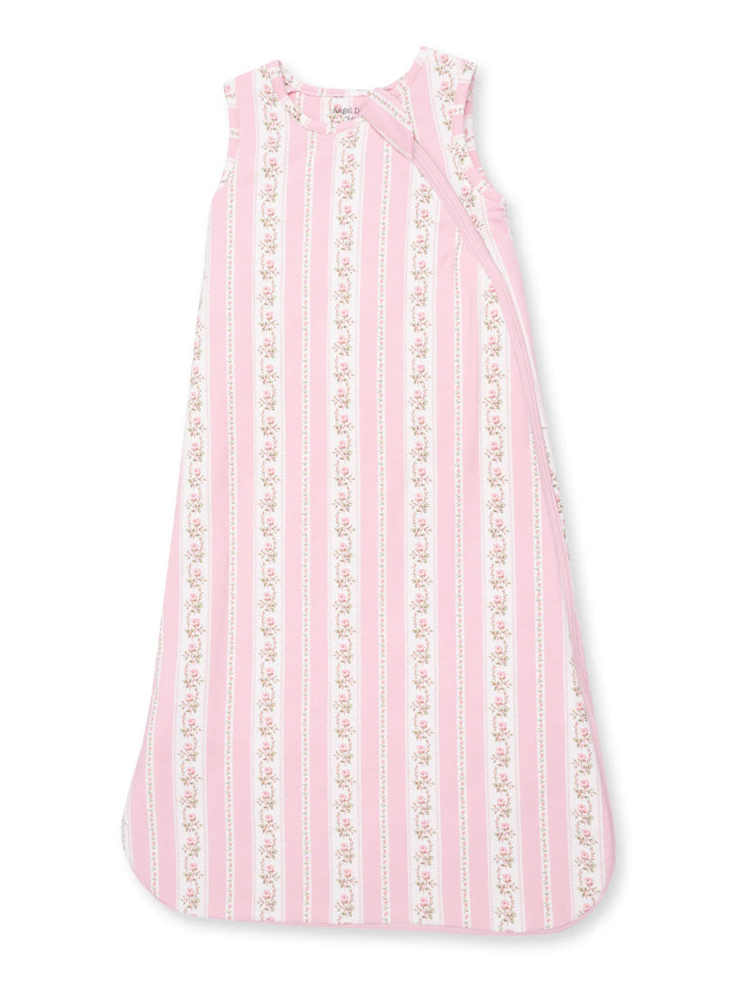 Pink baby sleep sack with floral stripes, featuring gentle pastel colors and sleeveless design. Ideal for comfort and safety.