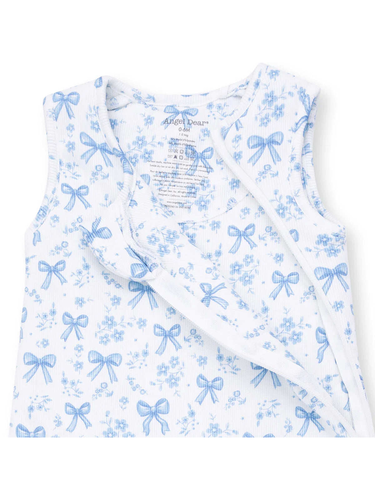 White sleeveless baby bodysuit with blue floral and bow patterns, labeled "Angel Dear."
