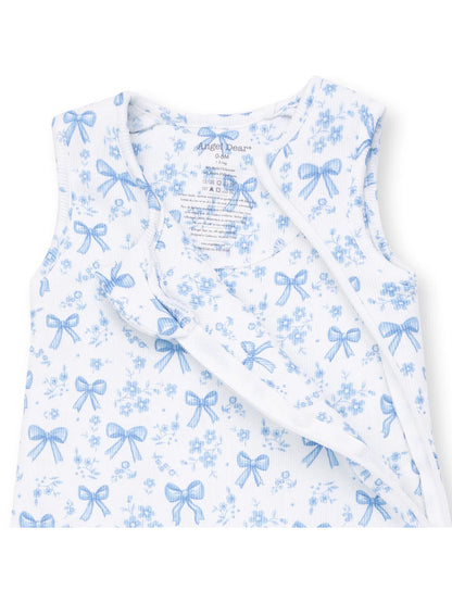 White sleeveless baby bodysuit with blue floral and bow patterns, labeled "Angel Dear."