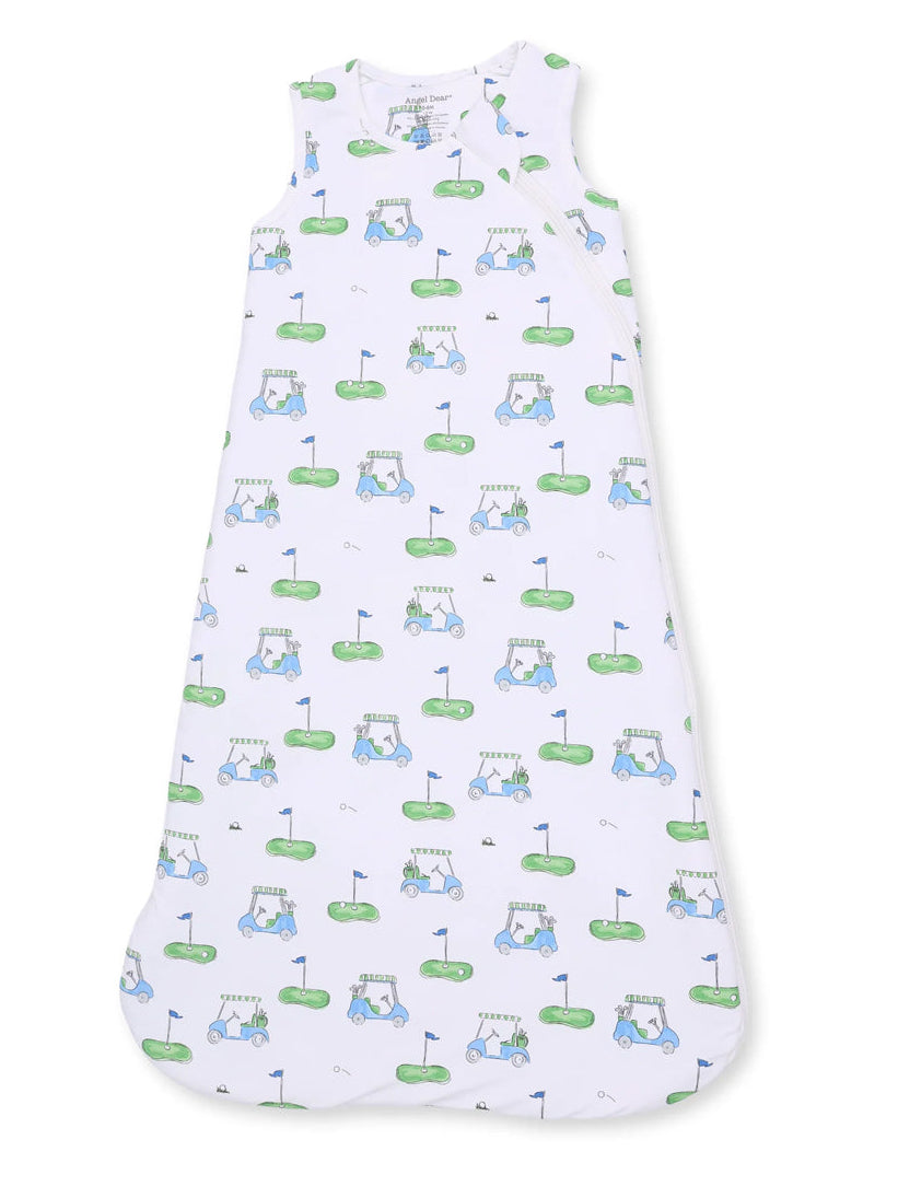 White sleeveless sleep sack with a playful golf cart and flag pattern in green and blue.