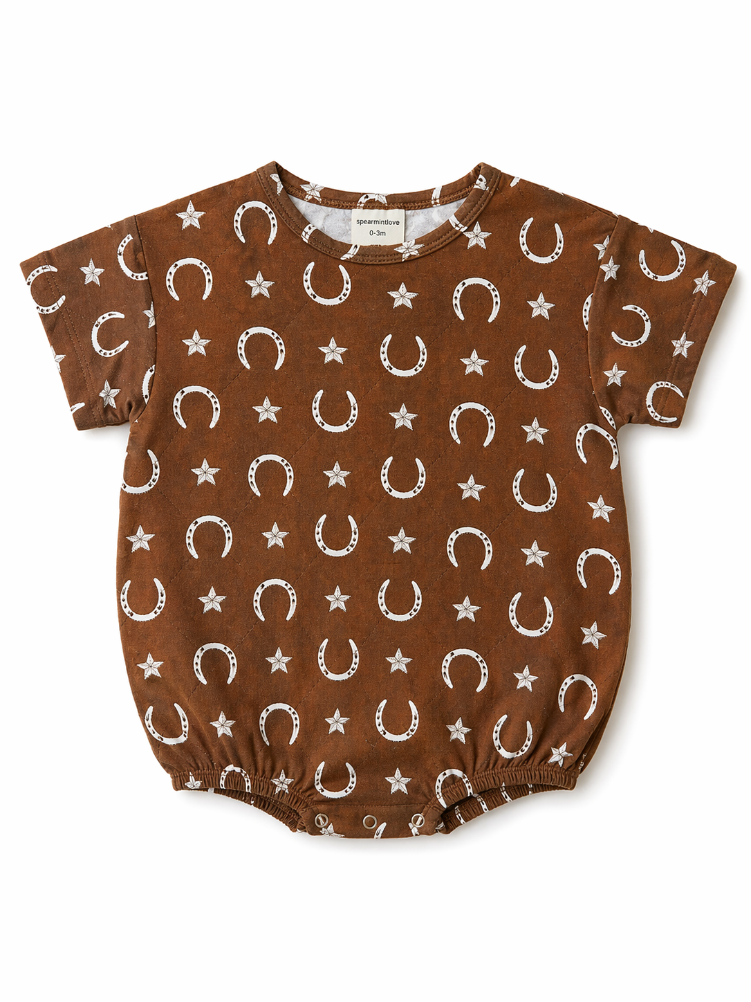 Brown baby shirt with white stars and horseshoe patterns, short sleeves and round neckline. Size: 0-3 months.