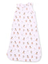 Light pink baby sleep sack with various cartoon dog patterns throughout. Ideal for comfort and safety.