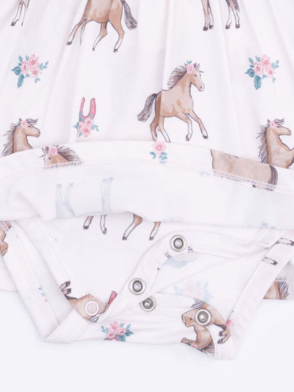 Baby onesie with a horse and floral pattern, featuring snap closure at the bottom.
