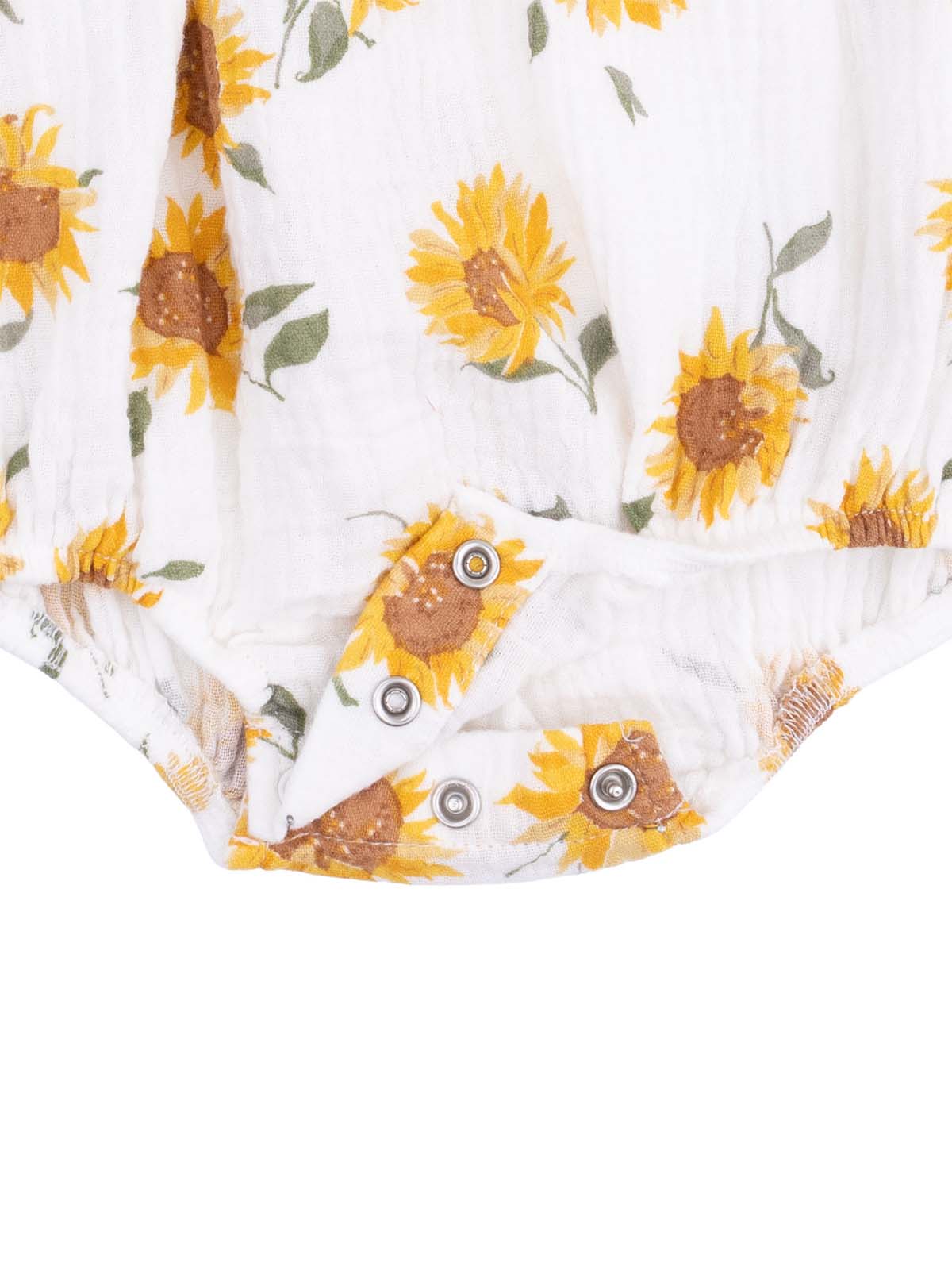 White fabric with a sunflower print, featuring snap closures at the bottom. Ideal for infants.