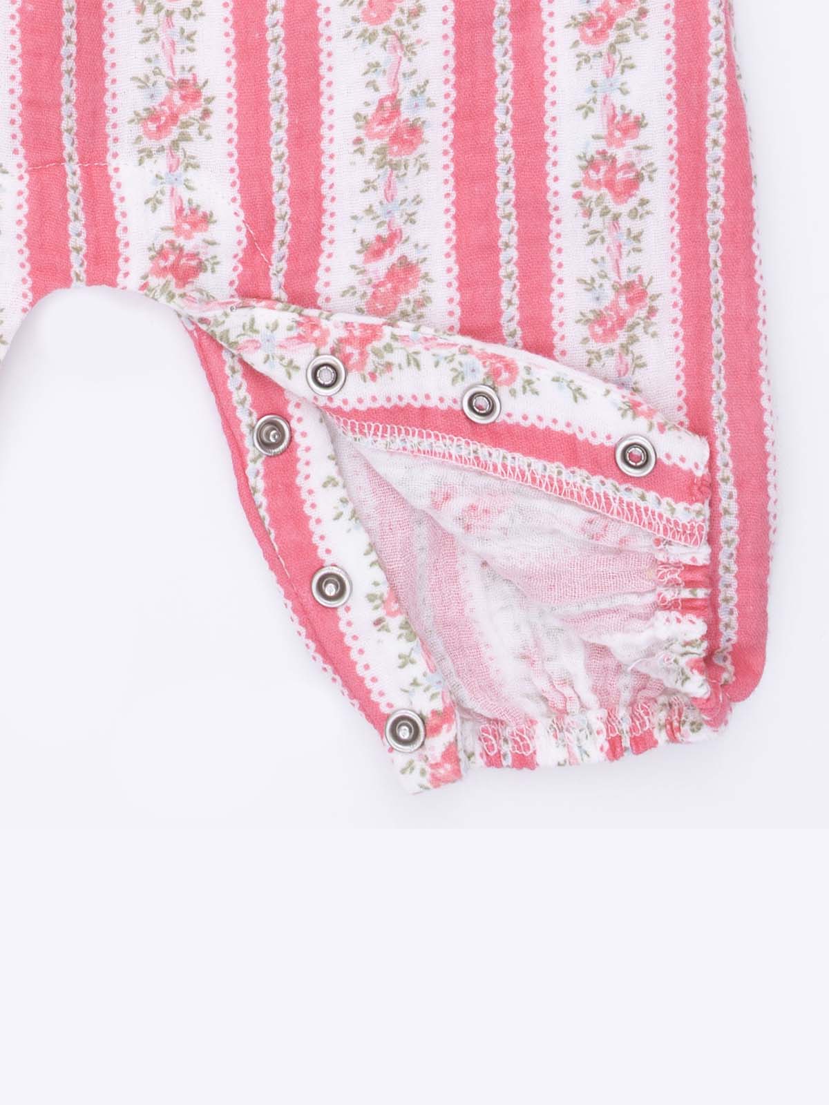 Pink striped baby romper with floral design and snap closures at the bottom.