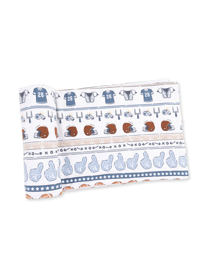 Football-themed wrapping paper featuring helmets, jerseys, and fan gestures.