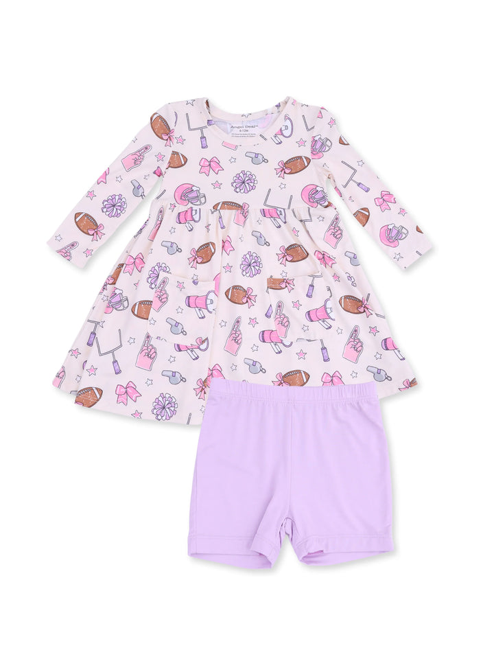 Pink dress with playful sports-themed prints and matching lavender shorts for girls. Cute and comfortable outfit.
