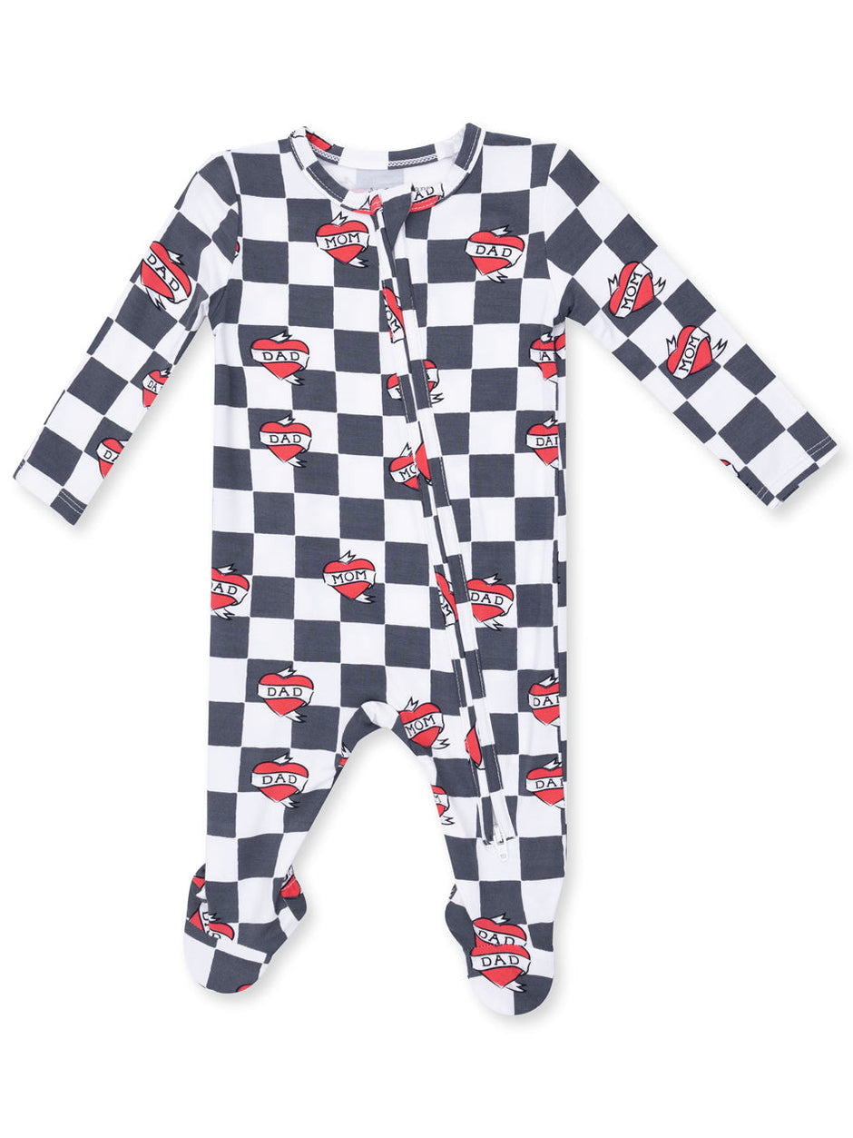 Black and white checkered onesie featuring red heart prints labeled "MOM" and "DAD." Cozy and playful design.