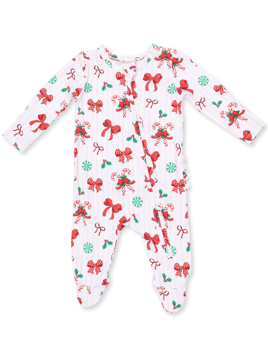 White infant onesie decorated with red bows, candy canes, and green peppermint designs. Ideal for holidays.