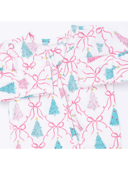 White fabric featuring colorful Christmas trees and pink bows in a playful, festive design.