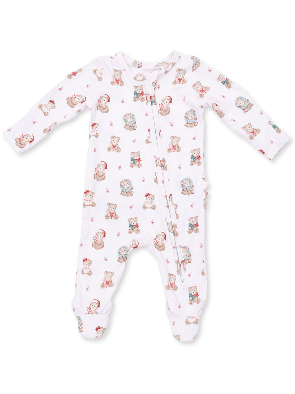 White baby onesie with colorful teddy bear print, featuring long sleeves and a front zipper.